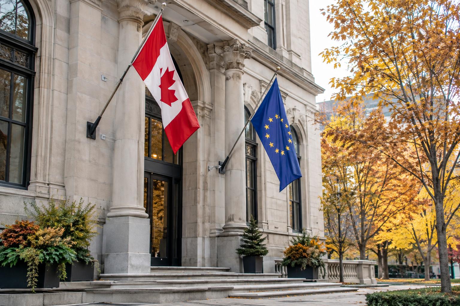 Exterior de un edificio institucional en Montreal, con banderas de Canadá y de la Unión Europea junto a la entrada, árboles otoñales y luz diurna, sin personas reconocibles.